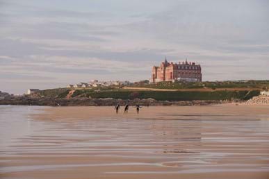 Surfing at Fistral Beach in Newquay, Cornwall